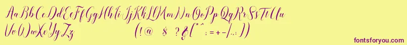 Czcionka pauline script – fioletowe czcionki na żółtym tle