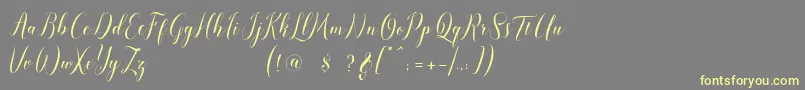 pauline script Font – Yellow Fonts on Gray Background