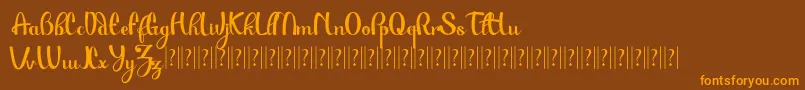 Paulo Pacito  -Schriftart – Orangefarbene Schriften auf braunem Hintergrund