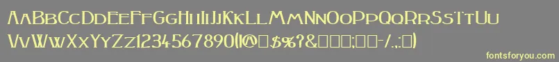 Peake Squat Bold-Schriftart – Gelbe Schriften auf grauem Hintergrund