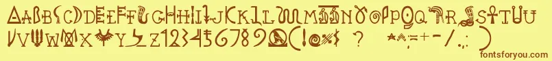 フォントPegypta – 茶色の文字が黄色の背景にあります。