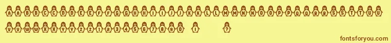 Penguins Font – Brown Fonts on Yellow Background