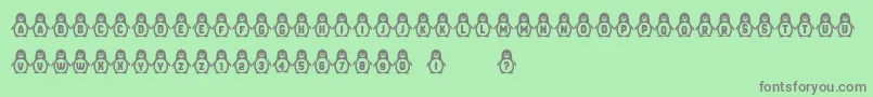 Penguins-Schriftart – Graue Schriften auf grünem Hintergrund