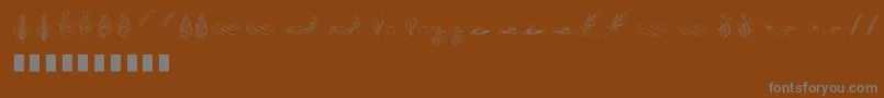 Шрифт Penmanship Feather – серые шрифты на коричневом фоне