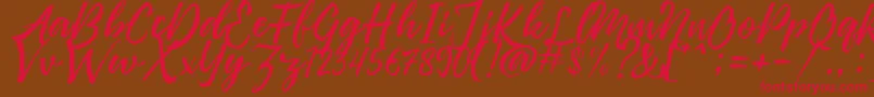 Pennelo Free Demo Font – Red Fonts on Brown Background