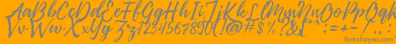 Pennelo Free Demo Font – Gray Fonts on Orange Background