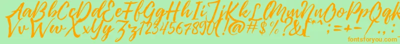 Pennelo Free Demo Font – Orange Fonts on Green Background