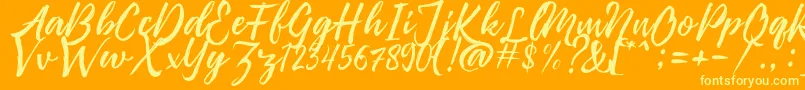 Pennelo Free Demo-Schriftart – Gelbe Schriften auf orangefarbenem Hintergrund