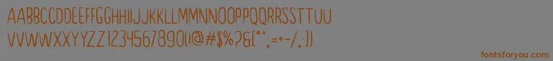 Perdana Font – Brown Fonts on Gray Background