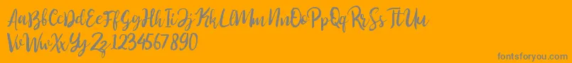Fonte Perfect Sweet – fontes cinzas em um fundo laranja