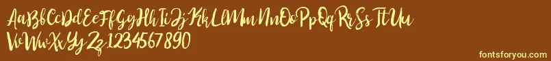 Fonte Perfect Sweet – fontes amarelas em um fundo marrom