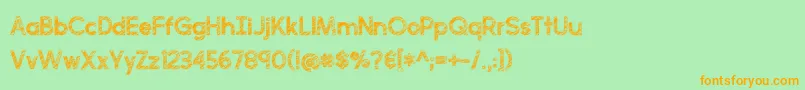 フォントperfectly scratchy – オレンジの文字が緑の背景にあります。