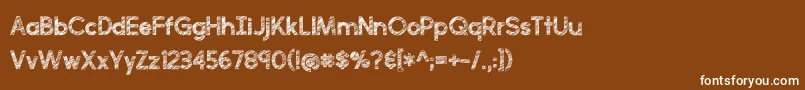 フォントperfectly scratchy – 茶色の背景に白い文字