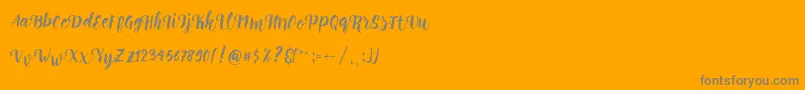 Perrota Script Free Demo-Schriftart – Graue Schriften auf orangefarbenem Hintergrund