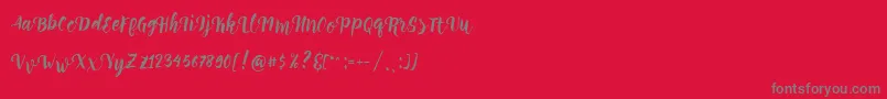 Perrota Script Free Demo Font – Gray Fonts on Red Background