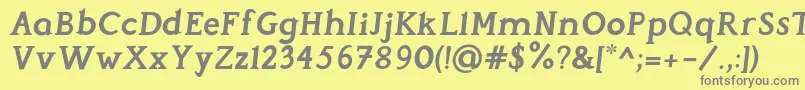 PerspicaciousItalic Bold-fontti – harmaat kirjasimet keltaisella taustalla