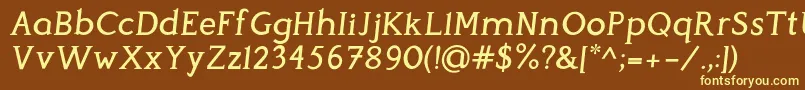 PerspicaciousItalic Medium-fontti – keltaiset fontit ruskealla taustalla