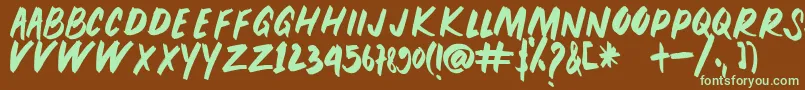 PEUNA BRUSH-fontti – vihreät fontit ruskealla taustalla