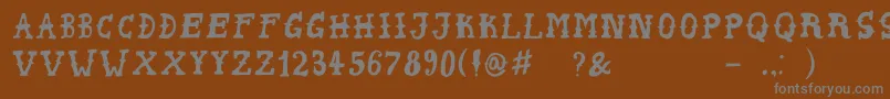 PeyoteHandwrite Font – Gray Fonts on Brown Background