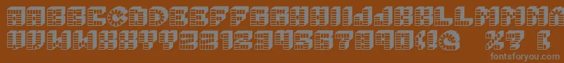 Pez font Font – Gray Fonts on Brown Background
