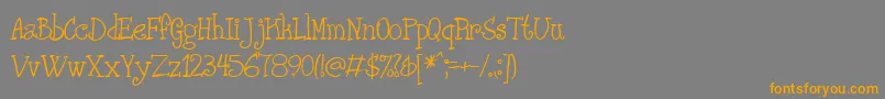 フォントPHANRG   – オレンジの文字は灰色の背景にあります。