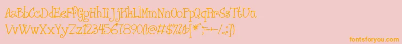 フォントPHANRG   – オレンジの文字がピンクの背景にあります。