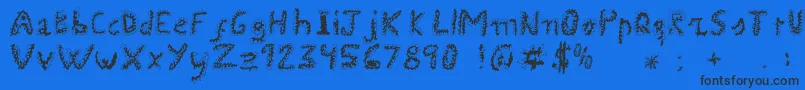 Uroboros Font – Black Fonts on Blue Background