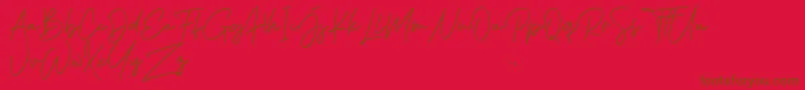 Phillips Muler Signature-Schriftart – Braune Schriften auf rotem Hintergrund