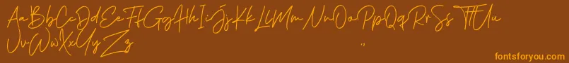 Phillips Muler Signature Font – Orange Fonts on Brown Background