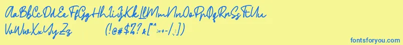 フォントPhillips – 青い文字が黄色の背景にあります。