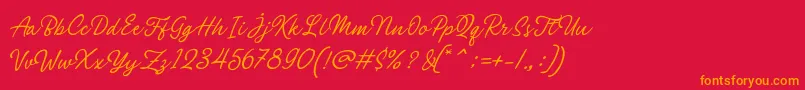 Police Philomena Script – polices orange sur fond rouge