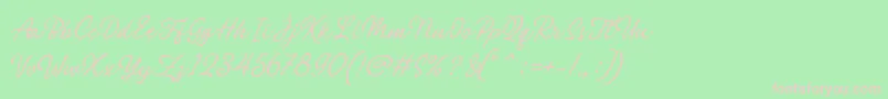 Philomena Script-Schriftart – Rosa Schriften auf grünem Hintergrund