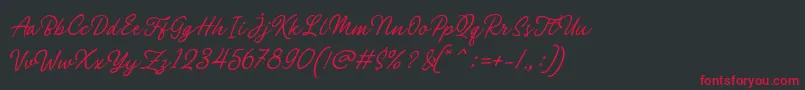 Philomena Script-Schriftart – Rote Schriften auf schwarzem Hintergrund