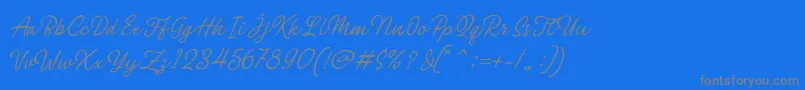 Philomena Script-Schriftart – Graue Schriften auf blauem Hintergrund