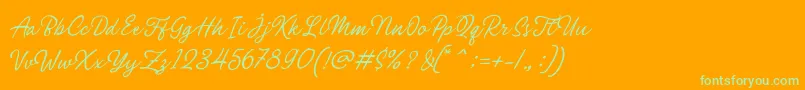 Philomena Script-Schriftart – Grüne Schriften auf orangefarbenem Hintergrund