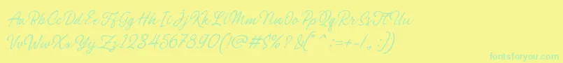 フォントPhilomena Script – 黄色い背景に緑の文字