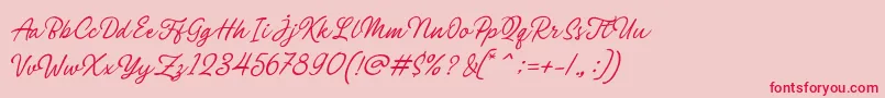 フォントPhilomena Script – ピンクの背景に赤い文字