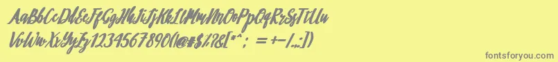 フォントphilosophy – 黄色の背景に灰色の文字