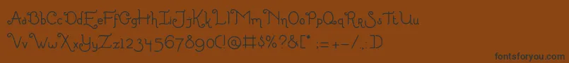 LittleEdelweiss Font – Black Fonts on Brown Background