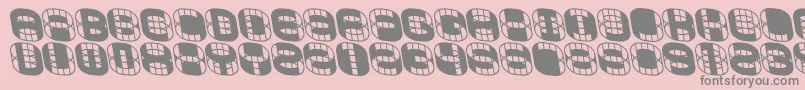 Saiba mais sobre a fonte PHONIE   Fonte PHONIE   – fontes cinzas em um fundo rosa