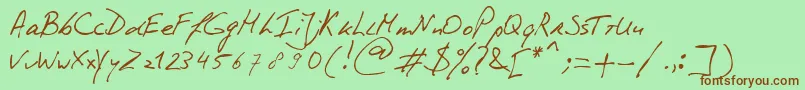 フォントPhontPhreaks Handwriting – 緑の背景に茶色のフォント