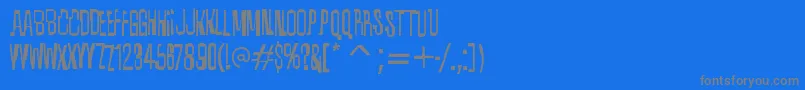 フォントQuixoticRegular – 青い背景に灰色の文字