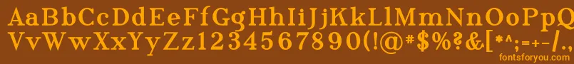 フォントPhosph10 – オレンジ色の文字が茶色の背景にあります。