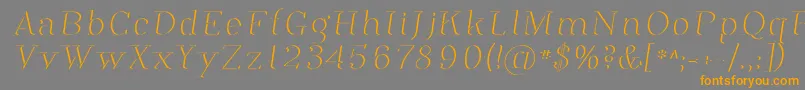 フォントPhosph12 – オレンジの文字は灰色の背景にあります。