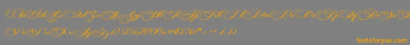 フォントPhotograph Script Free Personal  – オレンジの文字は灰色の背景にあります。