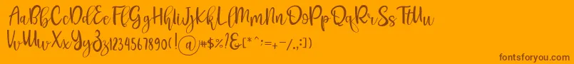 フォントPichellya Script – オレンジの背景に茶色のフォント