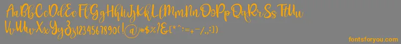 fuente Pichellya Script – Fuentes Naranjas Sobre Fondo Gris