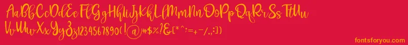 フォントPichellya Script – 赤い背景にオレンジの文字