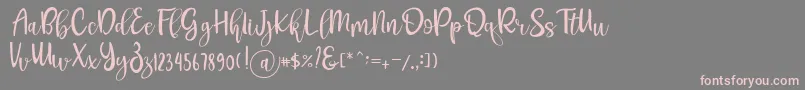 フォントPichellya Script – 灰色の背景にピンクのフォント