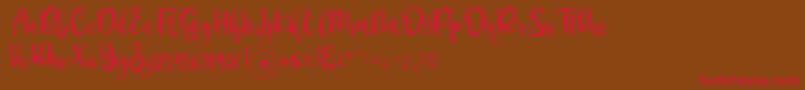 Pichellya Script Font – Red Fonts on Brown Background